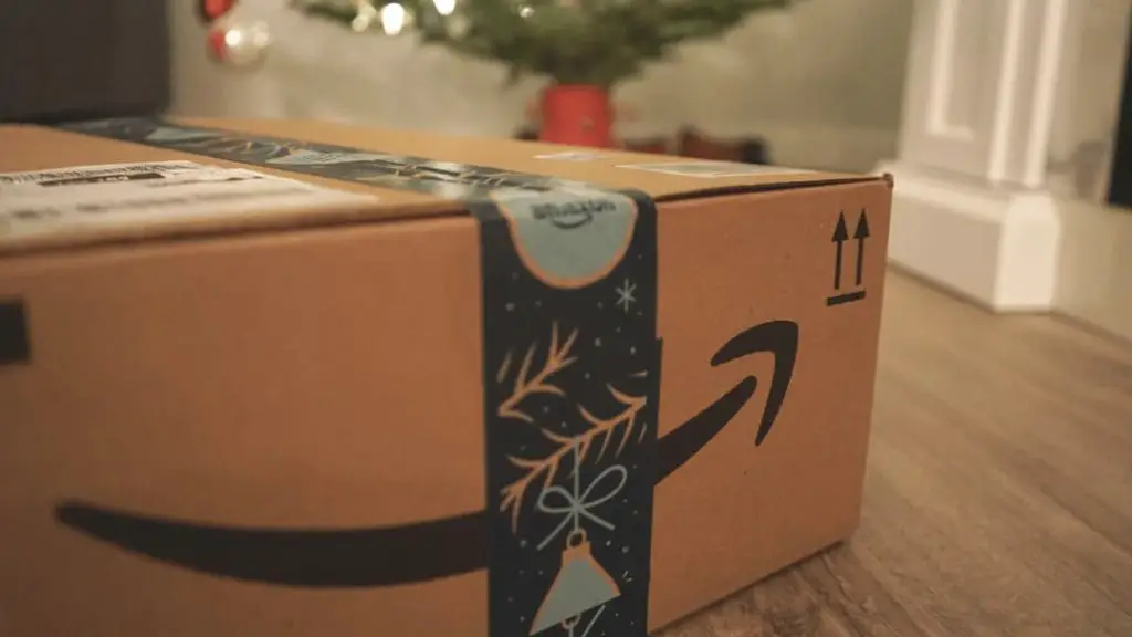 An Amazon box under a Christmas tree